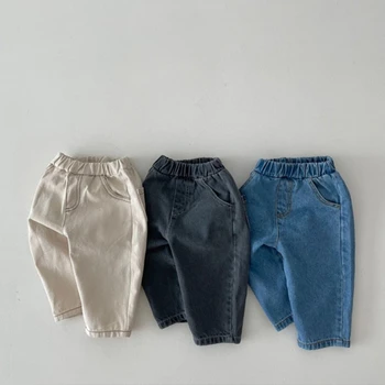 Джинсы для маленьких мальчиков 2023 года, Весенние новые однотонные повседневные джинсовые брюки для девочек из чистого хлопка, Модная детская одежда для мальчиков 0-24 м